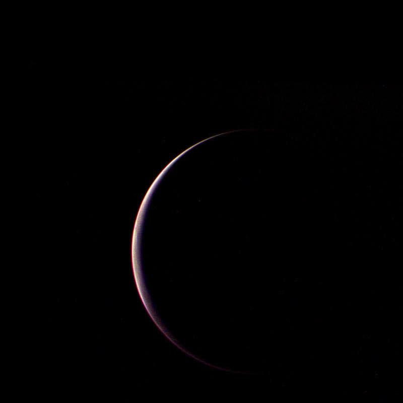 Neptune's moon triton, in the dark of deep space